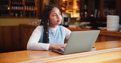 Remote work, idea and woman with laptop in restaurant for freelance job