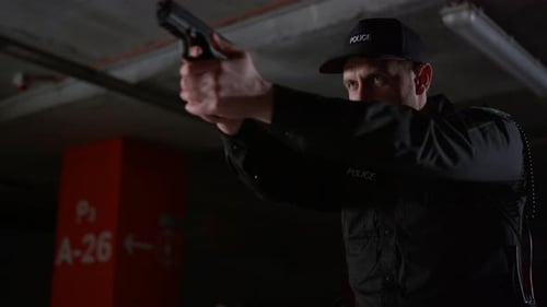 Dangerous Police Man Shooting From Gun in Urban Building. Male Police Officer