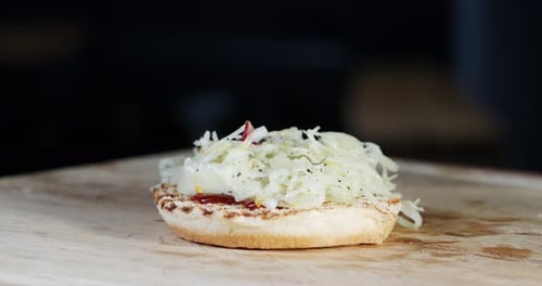 Delicious Sandwich Made with Pork, Bacon, and Coleslaw