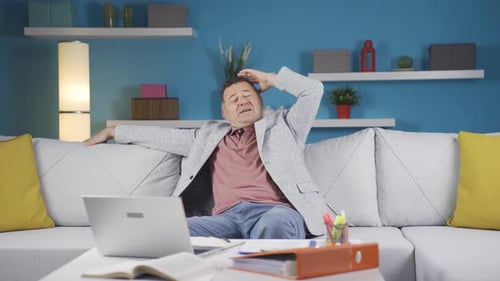 Home office worker man thinking about private life problems.