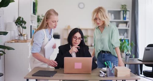Team of Office Workers Brainstorming to Solve Project Problem