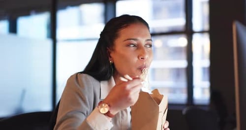 Fast food, delivery and business woman in office at night with noodles or lunch break while checking