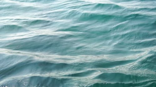 Sea Water Surface Camera Flies Over the Calm Azure Sea Nobody Holiday Recreation Concept Abstract