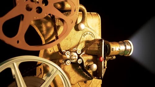 Antique Projector Showing Films in the Dark