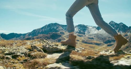 Traveler Foot in Trekking Shoes Walk on Mountain Top on Journey Adventure
