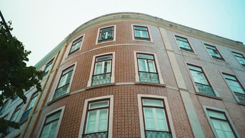 Lisbon ancient building tile facade with camera travel 4K