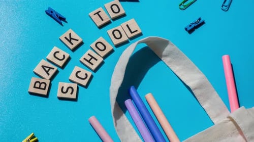 TIME LAPSE OF BACK TO SCHOOL Message Inscription Text on Wooden Blocks on Creative Colorful Blue