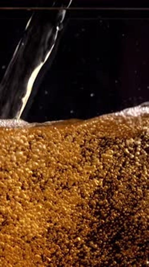 Experience Mesmerizing Slow Motion As Various Beverages Pour Into a Glass at 1000 Fps With Clear