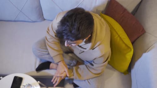 Crying man. Unsuccessful, angry, stressed man crying at home.