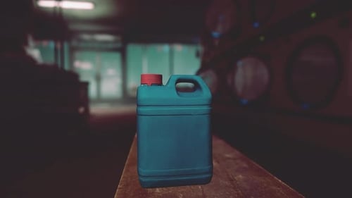 A Blue Plastic Container with a Red Cap