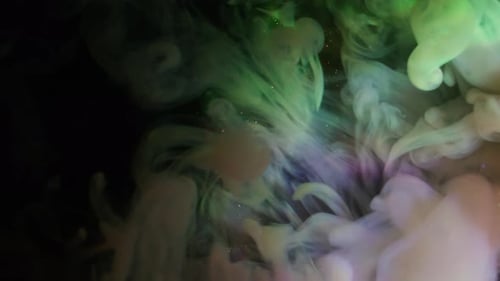 Colorful Ink Clouds Colliding in Deep Underwater Space
