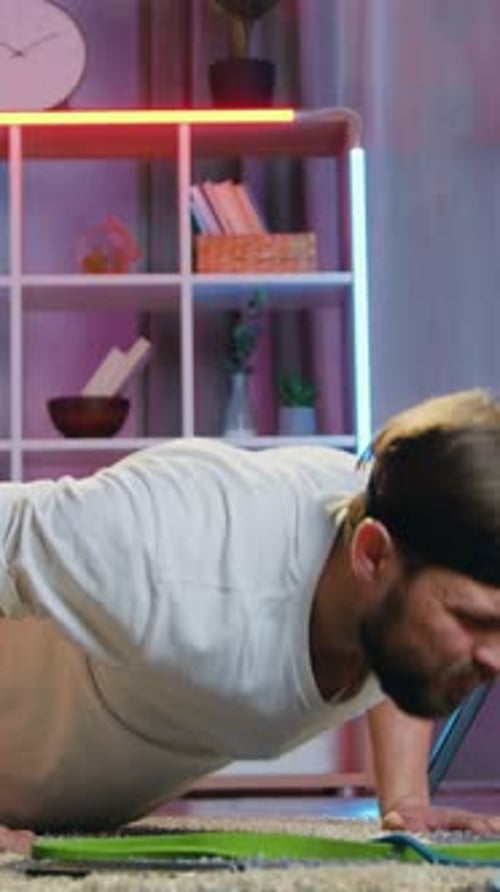 Attractive Welltrained Athletic 30Aged Bearder in Whitetshirt and Black Headband Pushuping From