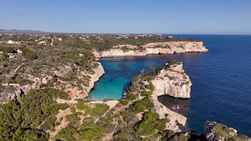 Drone shot of beautiful Caló del Moro beach with crystal clear water on Mallorca