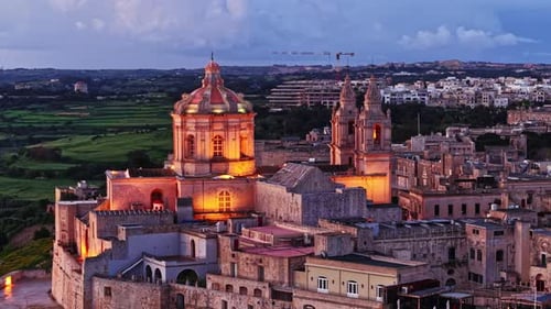 Beautiful aerial view of Malta highlighting historic architecture at sunset