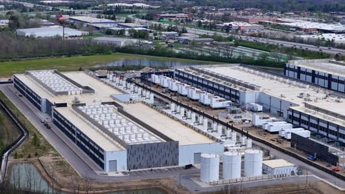 Large data center facility handling vast amounts of data storage and cloud computing services