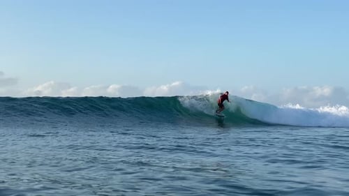 Surfer Riding in the Indian Ocean