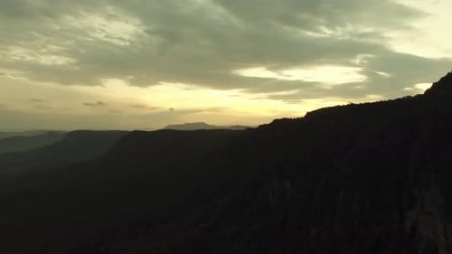 Arial Drone of Mountain Canyon/Mountain Range at Sunset