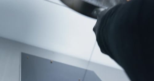 Chicken Pieces Tossed in Frying Pan in Kitchen