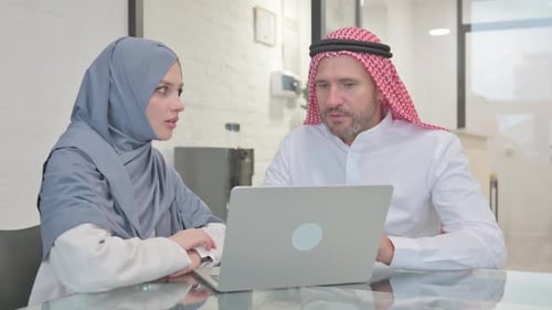 Business Meeting with Laptop in Modern Workplace