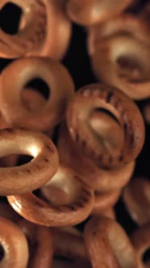 The Steering Wheel Crackers Rise and Fall on a Black Background Filmed on a Highspeed Camera at 1000