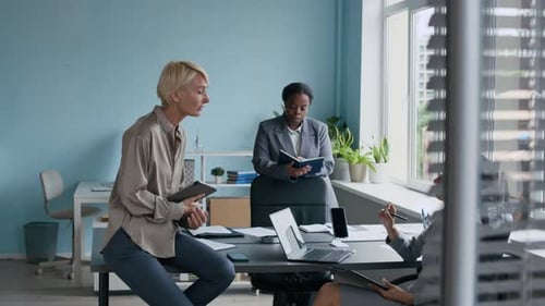 Business Meeting in Modern Office with Diverse Team
