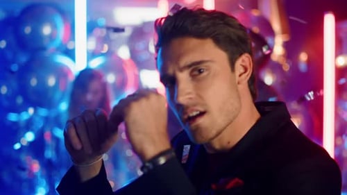 Portrait of Charming Man Clubbing on Neon Lights Background. Closeup Attractive Guy