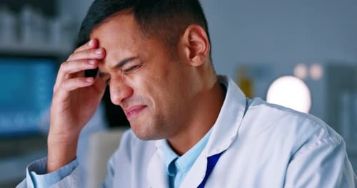 Stressed Scientist Working in Modern Laboratory