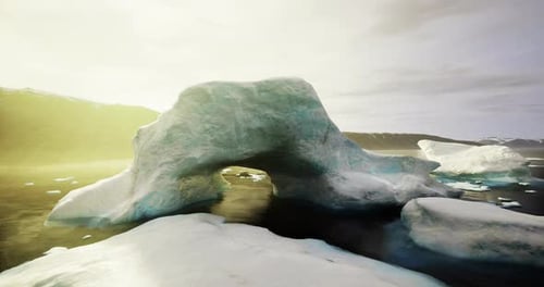 Majestic Ice Arch Formation Amidst Tranquil Waters in a Remote Arctic Landscape