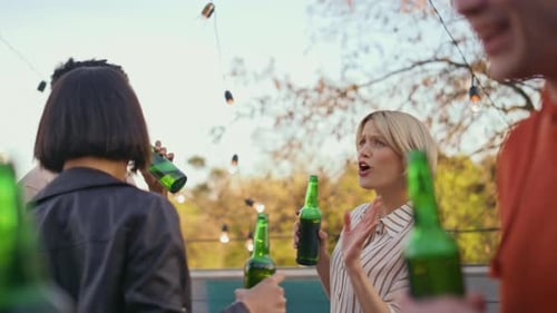 Group of Friends Drinking Beer in Urban Setting