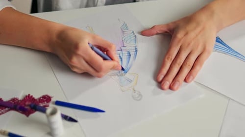 Fashion Designer Drawing Fashion Sketch