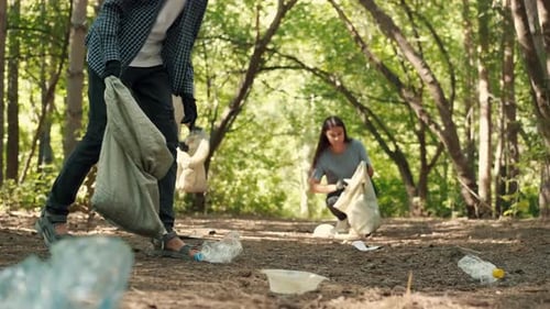 Volunteers Cleaning Trash in Green Urban Park