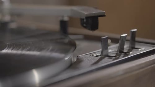 Turning on record player turntable for playing music