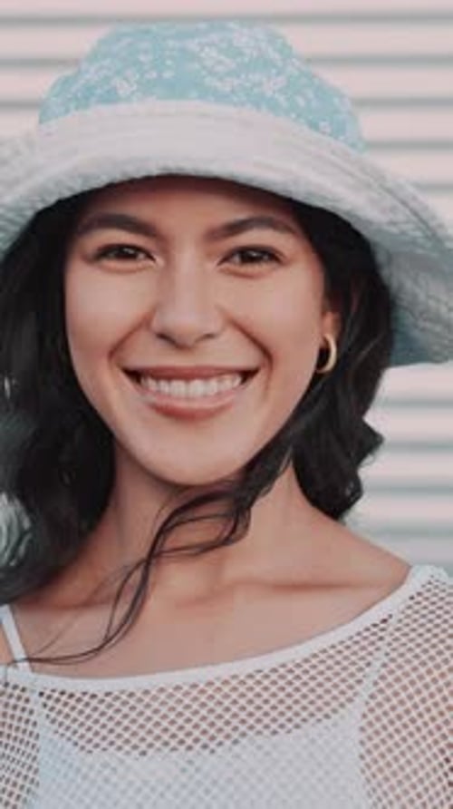 Smiling Woman with Hat Posing for the Camera
