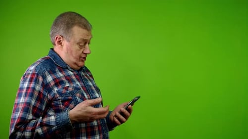 Man Talking on Phone on Green Screen
