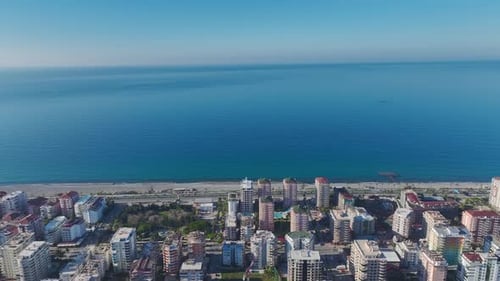 Aerial Video of a HighEnd Coastal Complex With Private Beach Access Large Pools and a Beautiful Sea