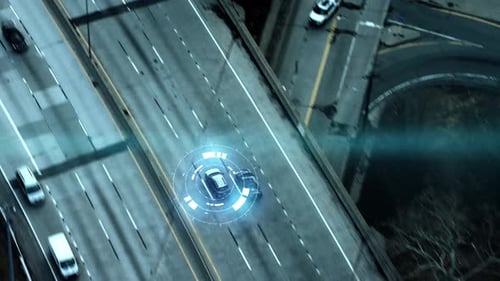 Futuristic self driving cars navigate the city highway for an action spy movie