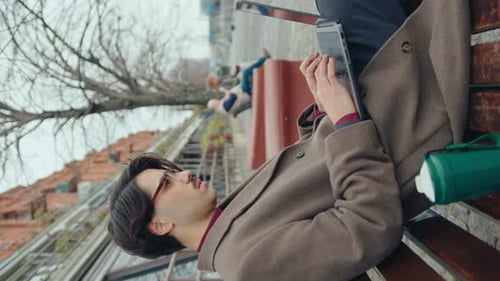 Businessman Working on Laptop Outdoors on Autumn Day