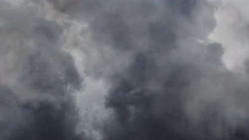 Dark Storm Clouds Moving Slowly in the Sky