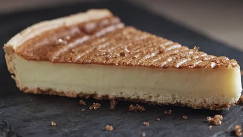 Close Up of Custard Tart being Sprinkled with Sugar