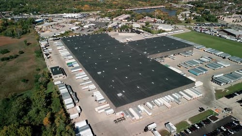 Aerial Wide Top Down View of Distribution Warehouse