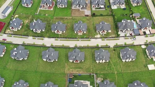Aerial Establishing Shot of a Suburban Neighborhood of Private Houses in Countryside Drone Point of