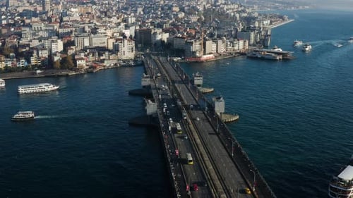 Vehicles Crossing The Galata Bridge Over The Golden Horn In Istanbul, Turkey. aerial