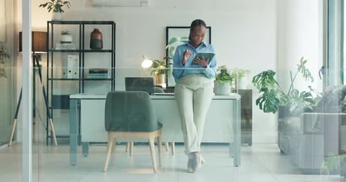 Business, tablet and black woman in office for reading report, insurance or schedule online
