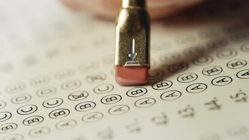 Female Student Correcting Wrong Answer During Exam Learning Process Selecting a New One Correction