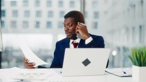 Angry Boss Talking By Phone with Employee Portrait of Black Man in Office Nervous Lawyer or