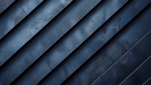 Dark, diagonal, textured metal panels