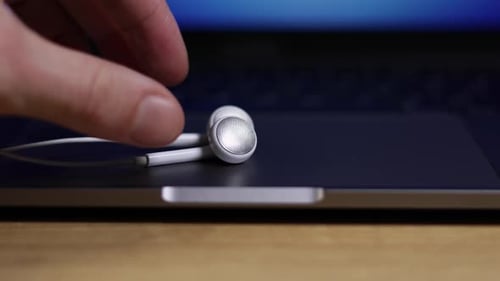 Earbuds on Laptop Picked Up