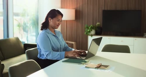 Businesswoman, typing and reading in office with laptop for finance proposal
