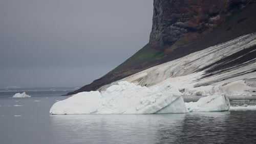 Iceberg Floating in Frigid Arctic Waters, Static Shot