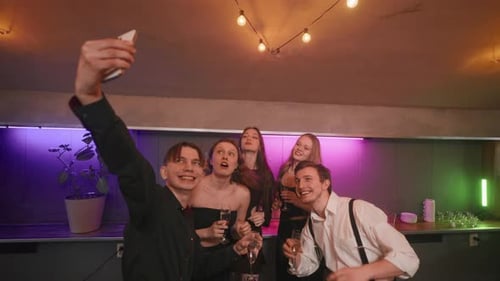Joyful Friends Taking Selfie By Smartphone in Merry Party in Christmas Night Happy Beautiful Women